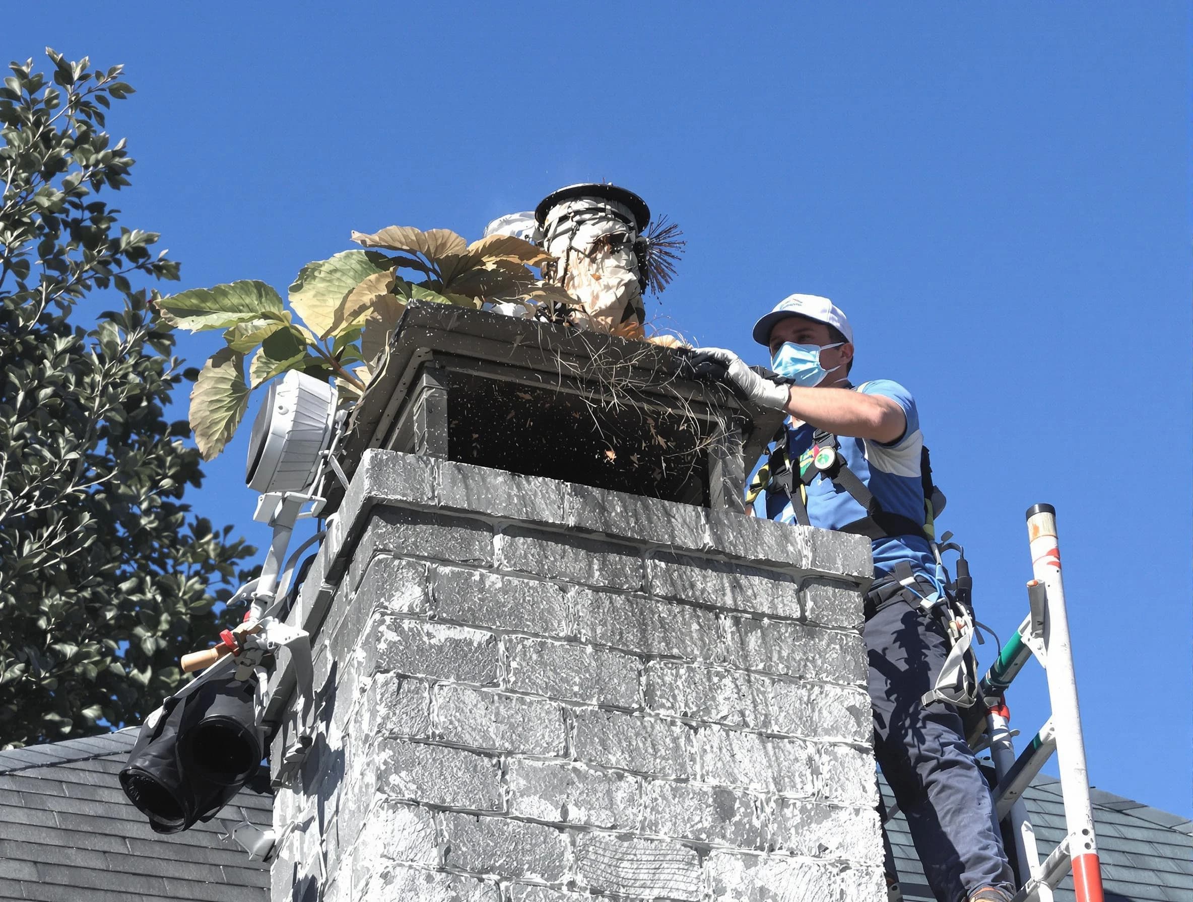 New River Chimney Sweep specialist performing chimney cleaning in New River, AZ