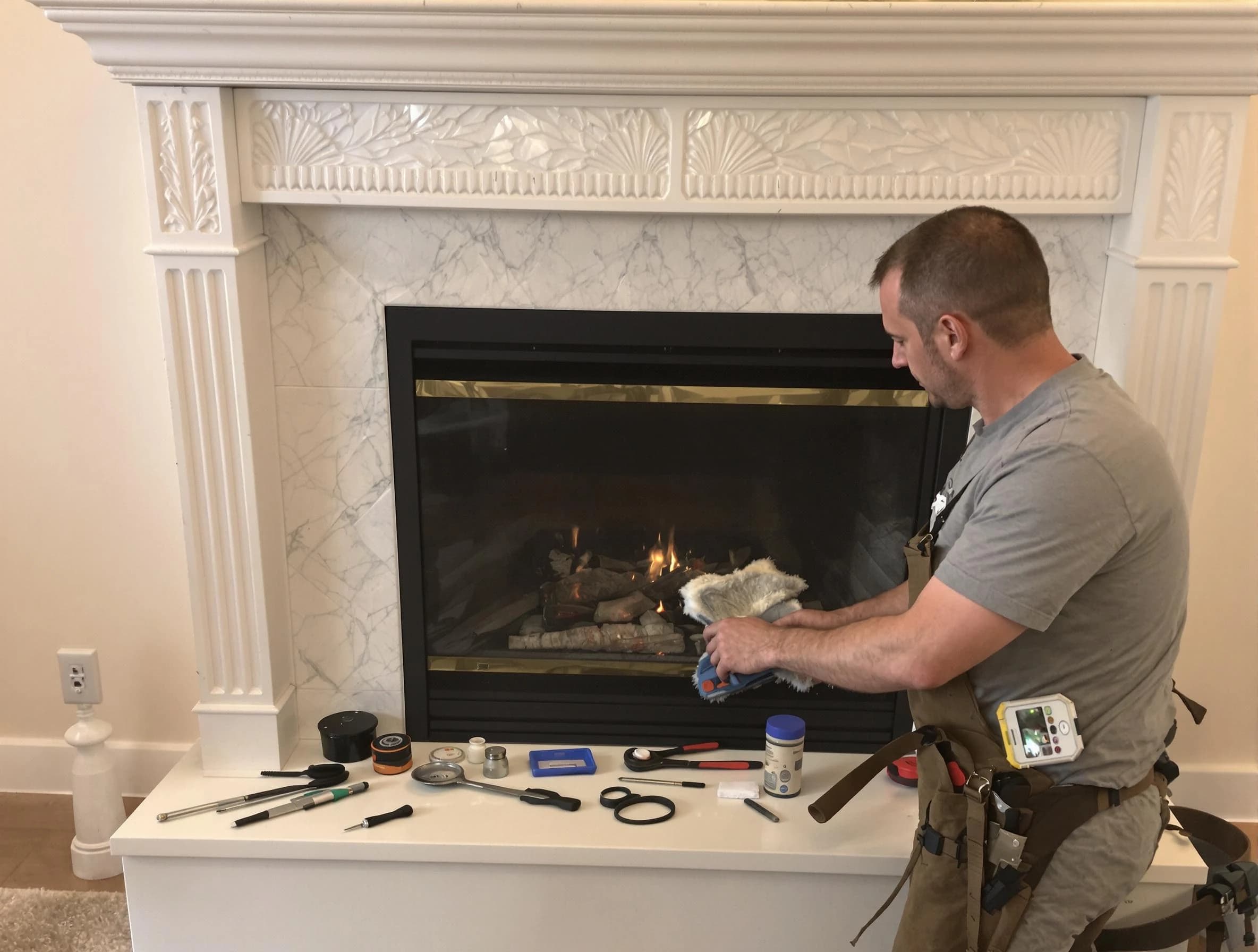 New River Chimney Sweep performing fireplace maintenance in New River, AZ